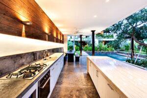 An outdoor kitchen featuring Werever outdoor cabinets