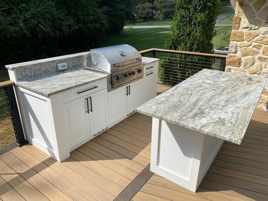 Small White Outdoor Kitchen in the Sun