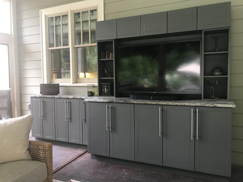 Custom outdoor cabinets incorporating a TV