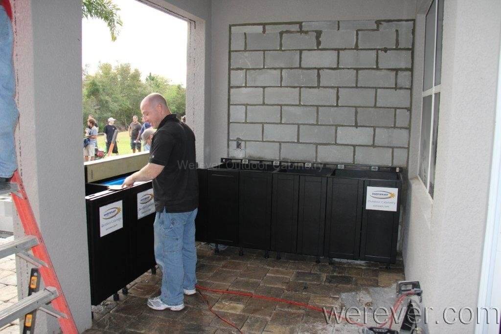 Chris DePaul levels outdoor cabinets