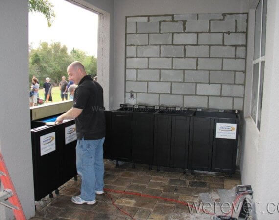 Chris DePaul levels outdoor cabinets