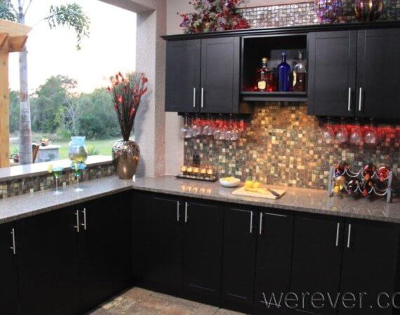 Dream outdoor kitchen with custom outdoor cabinets